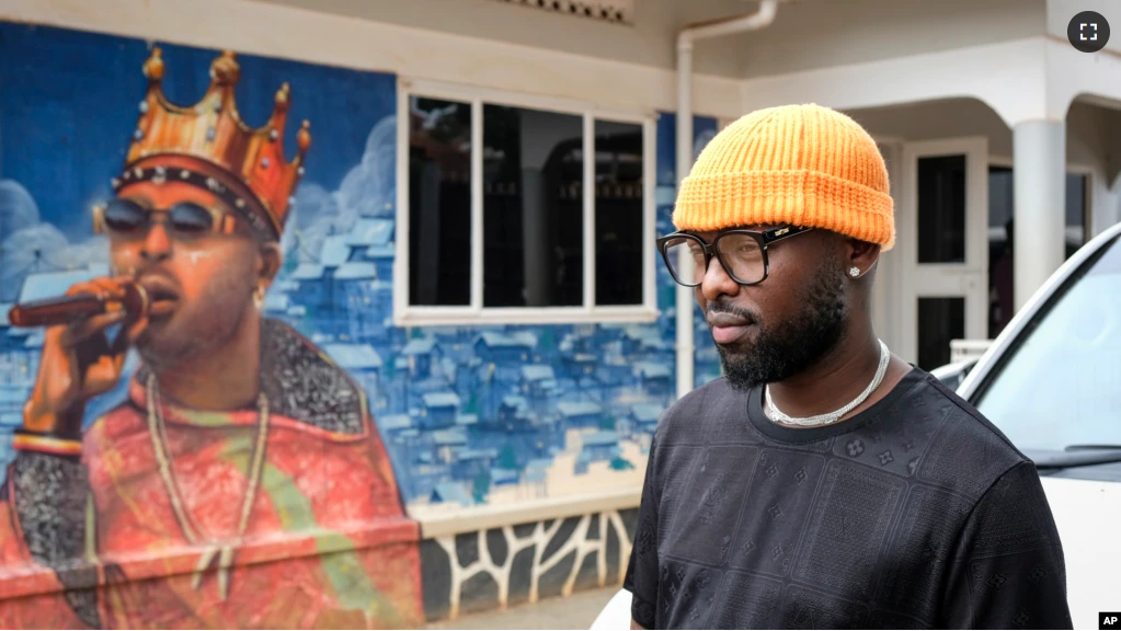 Ugandan singer Eddy Kenzo is seen outside his studio in the Makindye area of the capital Kampala, Uganda, Nov. 18, 2022. Kenzo became the first Uganda-based singer to earn a Grammy nomination. (AP Photo/Hajarah)