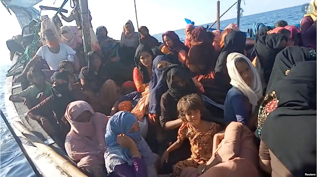 A boat carrying Rohingya refugees is seen stranded in waters off the coast of Bireuen, Aceh province, Indonesia, December 27, 2021, in this still image taken from a video. (Aditya Setiawan via REUTERS)