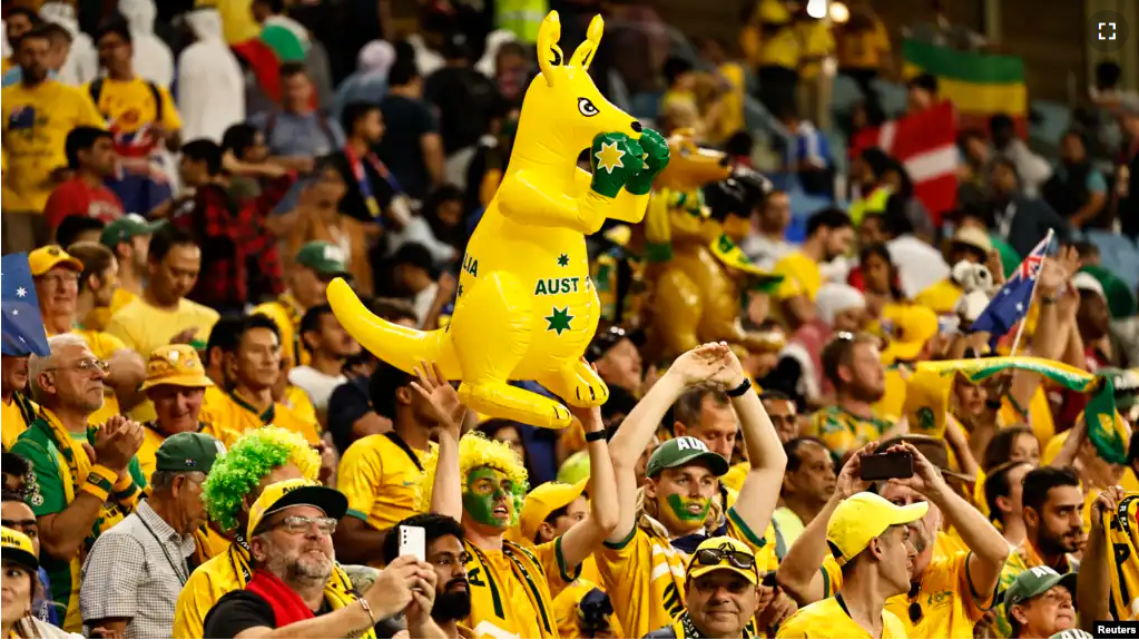 When it comes to soccer, many fans have a lot of skin in the game! Pictured here are Australian fans watching the match against Denmark during the World Cup in Qatar on November 30, 2022. (REUTERS/Hamad I Mohammed)