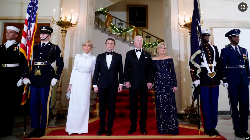 President Joe Biden and first lady Jill Biden pose for a photo with French President Emmanuel Macron and his wife Brigitte Macron in the White House before a State Dinner in Washington, Dec. 1, 2022. (AP Photo/Andrew Harnik)