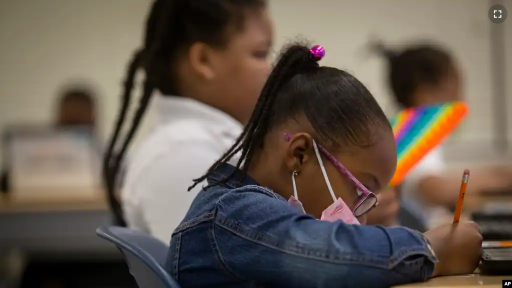 Students work in a classroom at Beecher Hills Elementary School on Friday, Aug. 19, 2022, in Atlanta.