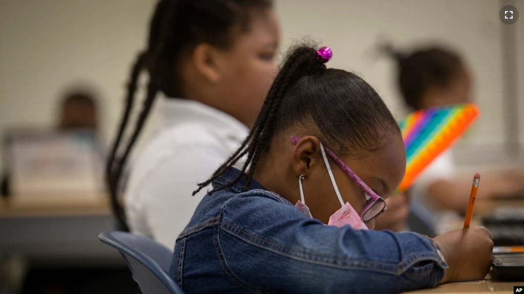 Students work in a classroom at Beecher Hills Elementary School on Friday, Aug. 19, 2022, in Atlanta. (AP Photo/Ron Harris)