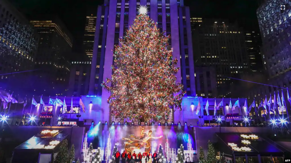 The Christmas Tree in Rockefeller Plaza is seen during the Lighting ceremony in New York City on November 30, 2022. (Photo by KENA BETANCUR / AFP)