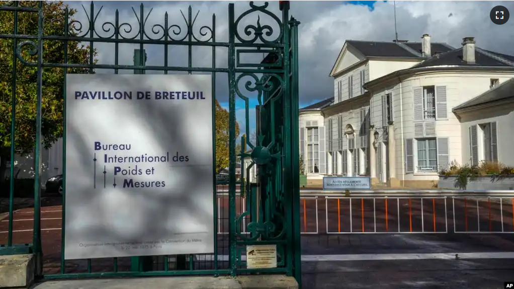 The entrance of the International Bureau of Weights and Measures is pictured in Sevres, outside Paris, Thursday, Nov. 17, 2022. (AP Photo/Michel Euler)