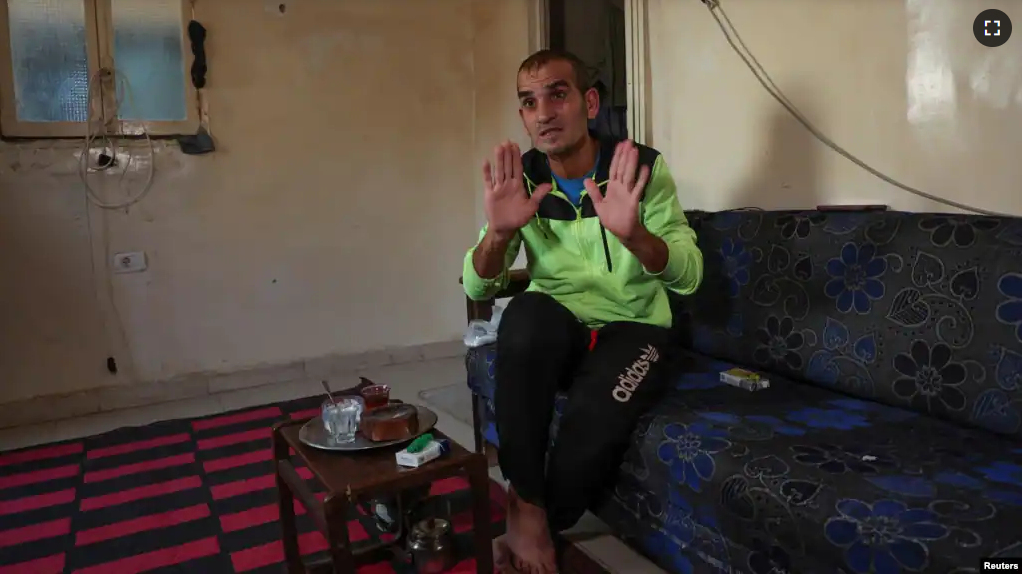 Unemployed Lebanese Hussein Hamadeh speaks during an interview with Reuters inside his home in Beirut's southern area of Ouzai, Lebanon on November 15, 2022. (REUTERS/Mohamed Azakir)