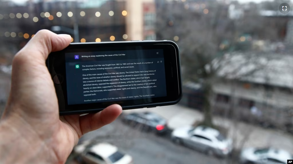 A ChatGPT prompt is shown on a device near a public school in Brooklyn, New York, Thursday, Jan. 5, 2023. (AP Photo/Peter Morgan)