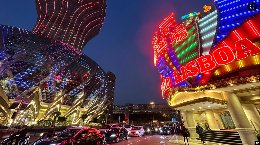 Casino Lisboa, right, is seen in Macao on Dec. 28, 2022. (AP Photo/Kanis Leung)