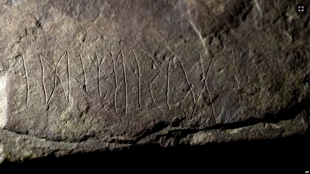 The runestone found at Tyrifjorden, Norway, is shown at the Museum of Cultural History in Oslo, Thursday, Jan. 12, 2023. (Javad Parsa/NTB Scanpix via AP)