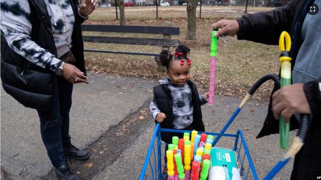 When Holifield and her daughter had COVID-19 in May, the toddler had to miss 15 days of child care. (AP Photo/Erin Hooley)