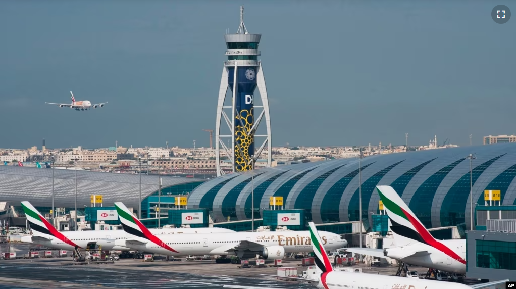 In this file photo, an Emirates jetliner comes in for landing at Dubai International Airport in Dubai, United Arab Emirates, Dec. 11, 2019. (AP Photo/Jon Gambrell, File)