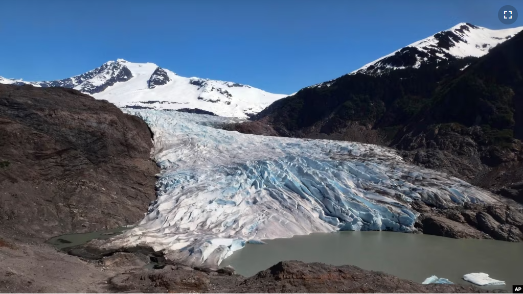 In this file photo, pieces of ice float on Mendenhall Lake in front of the Mendenhall Glacier on Monday, May 30, 2022, in Juneau, Alaska. (AP Photo/Becky Bohrer)