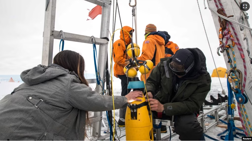 Scientists work in the field at the Thwaites Glacier in Antarctica in this undated handout picture obtained by Reuters on February 14, 2023. (Becka Bower/Cornell University/Handout via REUTERS)