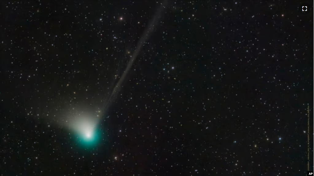 This photo provided by Dan Bartlett shows comet C/2022 E3 (ZTF) on Dec. 19, 2022. It last visited during Neanderthal times, according to NASA. (Dan Bartlett via AP)