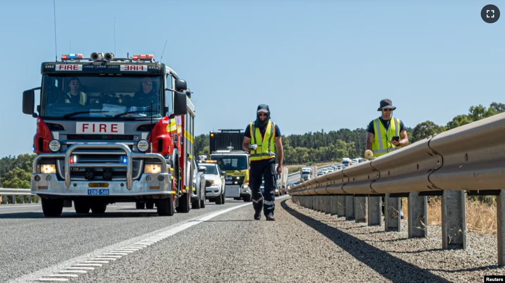 A handout image shows Department of Fire and Emergency Services crew searching for a radioactive capsule from a Rio Tinto mine.