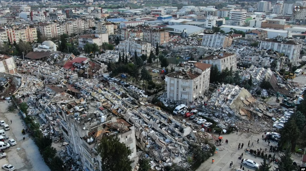 Aerial photo shows the destruction in Hatay city center, southern Turkey, Feb. 7, 2023. (IHA via AP)