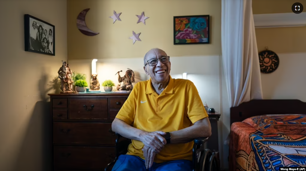 Alex Morisey listens to music in his room at a nursing home in Philadelphia, on Wednesday, Feb. 15, 2023. (AP Photo/Wong Maye-E)