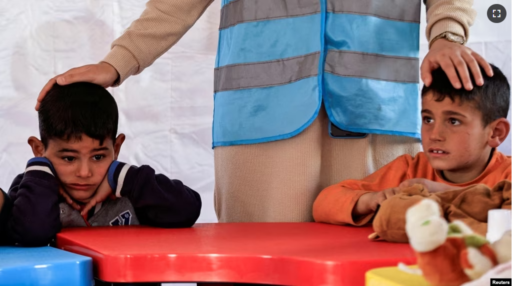 FILE - Children attend an activity to entertain and support the mental health of children affected by the deadly earthquake, at a camp for survivors in Adiyaman, Turkey, February 18, 2023. (REUTERS/Thaier Al-Sudani/File Photo)