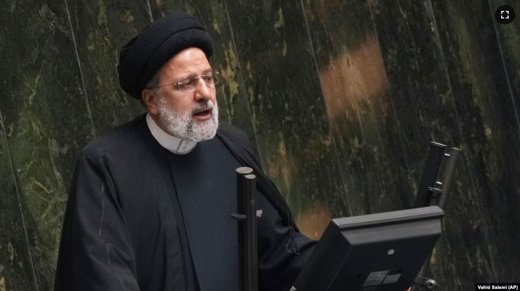 FILE - Iranian President Ebrahim Raisi addresses lawmakers while defending his next year's budget bill at the parliament in Tehran, Iran, Sunday, Jan. 22, 2023.