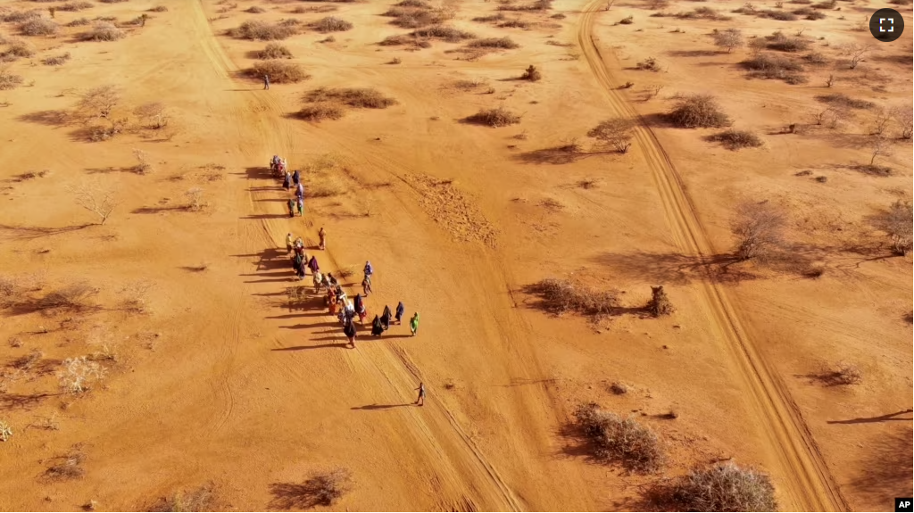 FILE - People arrive at a displacement camp on the outskirts of Dollow, Somalia on Septemer 21, 2022 amid a drought. (AP Photo/Jerome Delay, File)