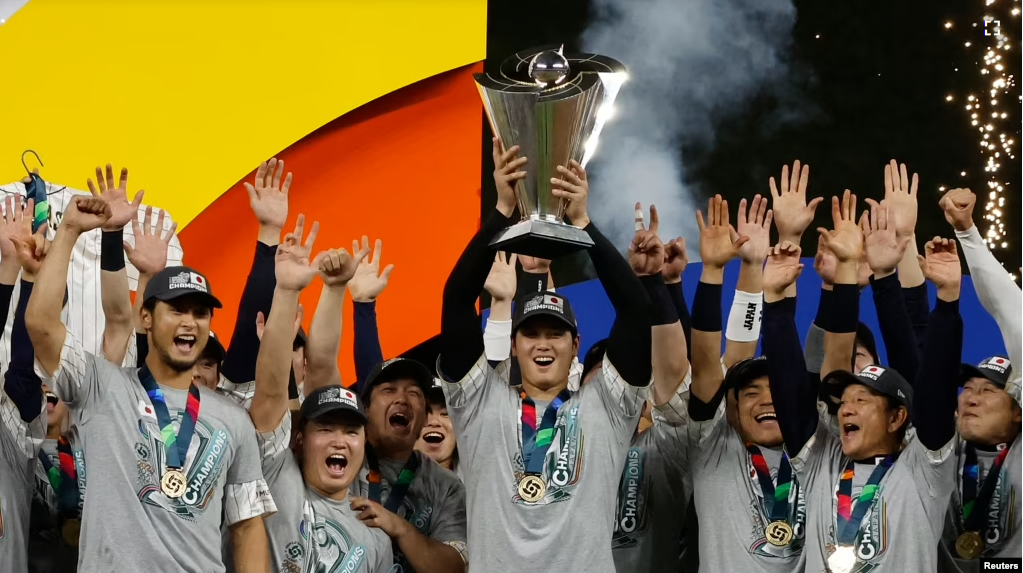 Shohei Ohtani and team Japan celebrate with the World Baseball Classic trophy after defeating the USA in the World Baseball Classic Mar. 21, 2023. (Rhona Wise-USA TODAY Sports)