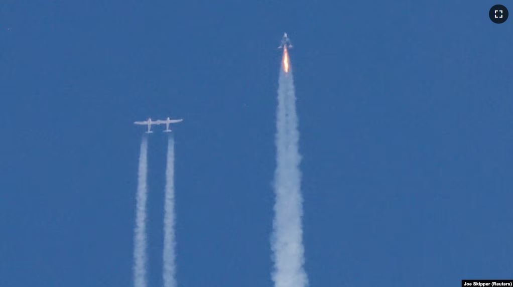 Virgin Galactic's passenger rocket plane VSS Unity, carrying billionaire entrepreneur Richard Branson and his crew, begins its ascent to the edge of space above Spaceport America near Truth or Consequences, New Mexico, U.S., July 11, 2021. REUTERS/Joe Skipper