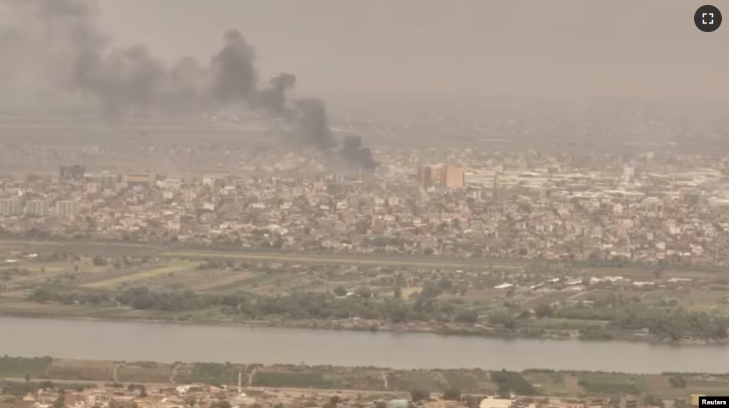 A drone view shows smoke rising over the Khartoum North Light Industrial Area, in Bahri, Sudan, April 23, 2023, in this still image taken from video obtained by Reuters. (Video obtained by Reuters/ via REUTERS)