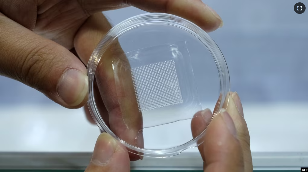 A person displays a microneedle patch by the Win Coat Corporation at the 2018 Future Tech Expo in Taipei, Dec. 13, 2018.