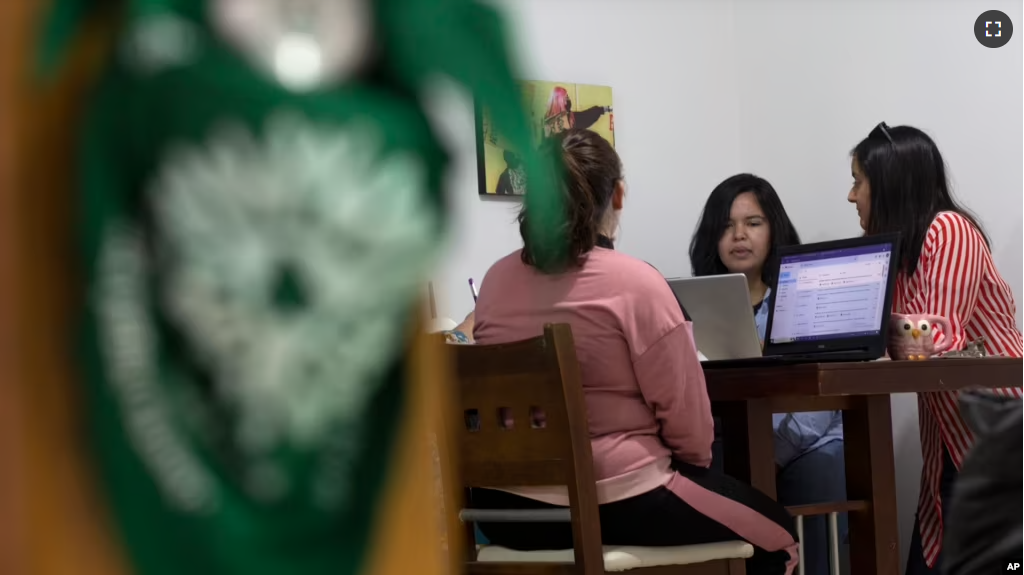 Members of the Marea Verde Chihuahua collective meet at their headquarters in Chihuahua, Mexico on March 13, 2023. (AP Photo/Adriana Esquivel)