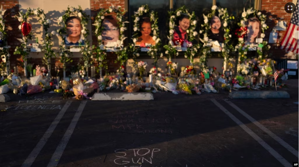 FILE - Messages are written at a memorial outside Star Dance Studio in Monterey Park, California, Thursday, January 26, 2023. The U.S. is setting a record pace for mass killings in 2023. (AP Photo/Jae C. Hong, File)