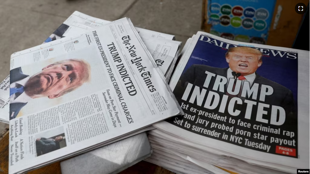 New York newspapers are displayed at a newsstand following former U.S. President Donald Trump's indictment by a Manhattan grand jury following a probe into hush money paid to porn star Stormy Daniels, in New York, March 31, 2023. (REUTERS/Mike Segar)