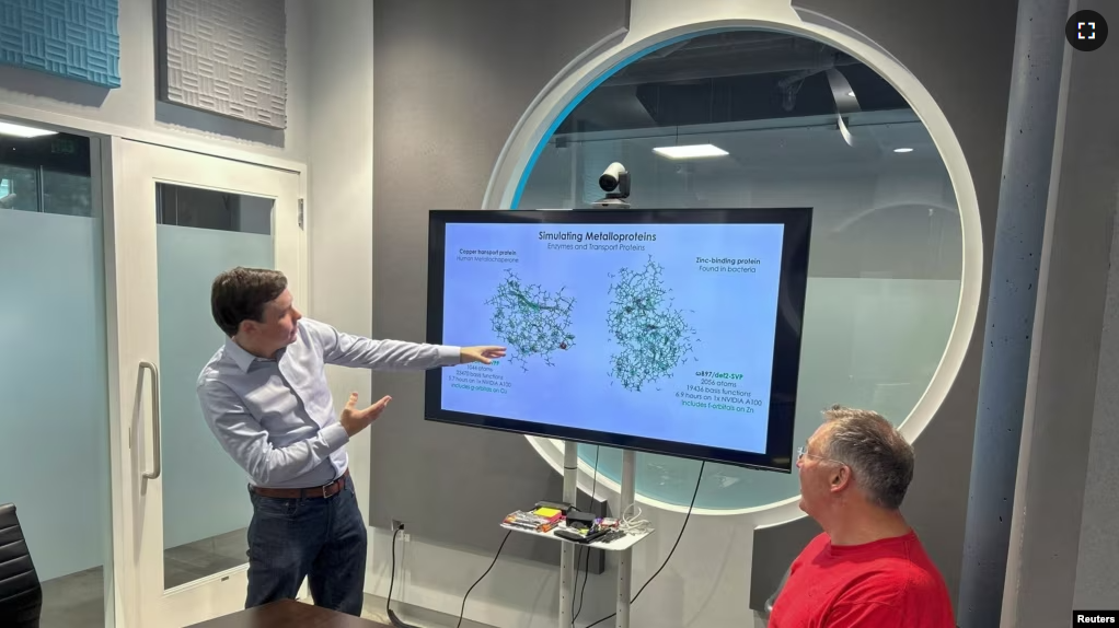 Robert Parrish, Head of the Quantum Chemistry division at QC Ware, and Matt Johnson, CEO of QC Ware, review computations on large metalloproteins in Palo Alto, California, U.S. on March 29, 2023. (QC Ware/Handout via REUTERS)