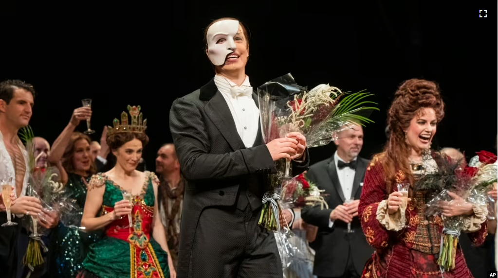 "The Phantom of the Opera" cast on stage after the final performance of the famous Broadway show in New York City, on April 16, 2023. (Photo by Charles Sykes/Invision/AP)