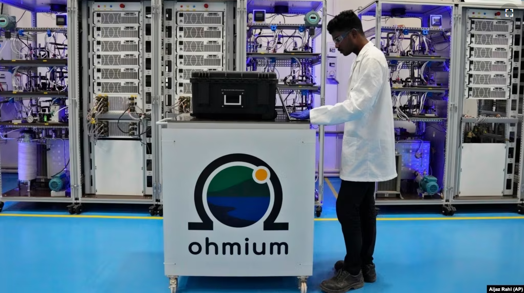 An engineer works at the Ohmium manufacturing facility in Chikkaballapur, India, Tuesday, April 25, 2023. The company announced April 26, 2023 it has raised $250 million to expand production of machines that can make clean hydrogen and displace fossil fuels. (AP Photo/Aijaz Rahi)