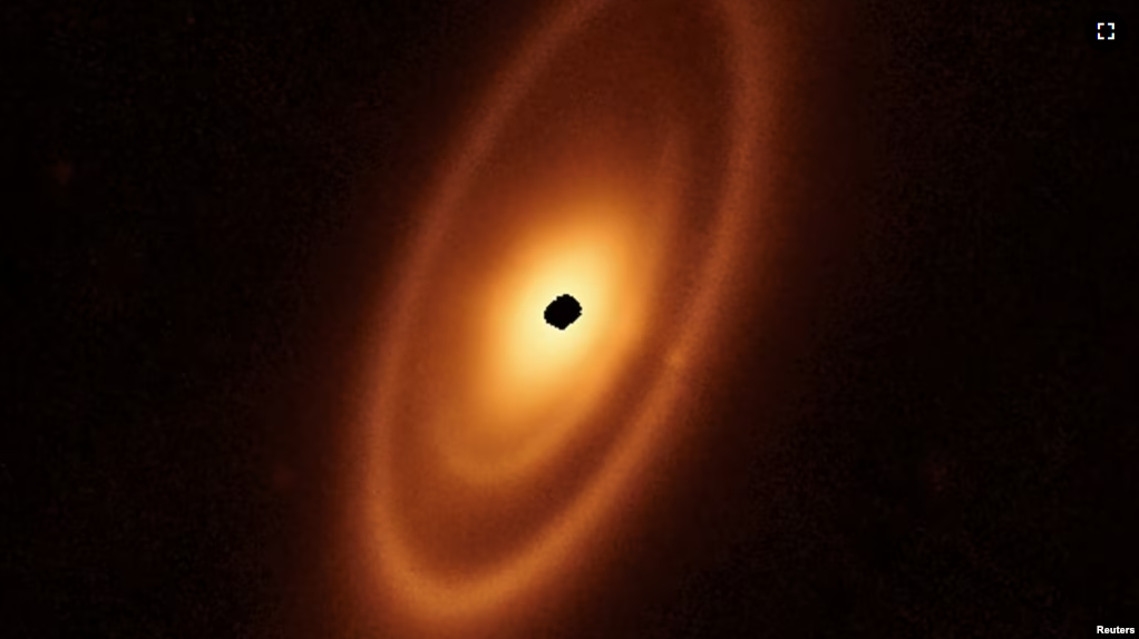 FILE - This image of the dusty debris disk surrounding the star Fomalhaut is from the James Webb Space TelescopeÕs Mid-Infrared Instrument (MIRI), (23 billion kilometers) from the star. The inner belts were revealed by Webb for the first time. (NASA, ESA, CSA/Handout via REUTERS)