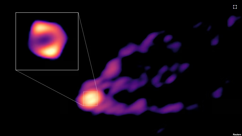 This image shows the jet and shadow of the black hole at the center of the M87 galaxy together for the first time. (NRAO/AUI/NSF/Handout via REUTERS)