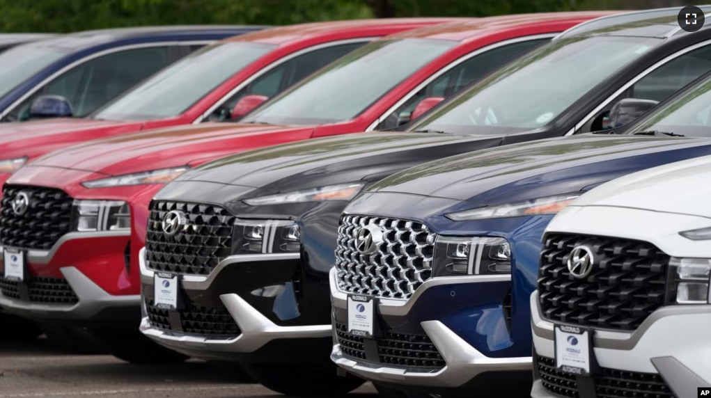 FILE - A line of 2022 Santa Fe SUV's sit outside a Hyundai dealership Sunday, Sept. 12, 2021, in Littleton, Colo. (AP Photo/David Zalubowski, File)