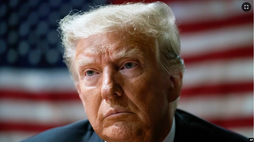 FILE - Former President Donald Trump attends an event with supporters at the Westside Conservative Breakfast, in Des Moines, Iowa, Thursday, June 1, 2023. (AP Photo/Charlie Neibergall, File)