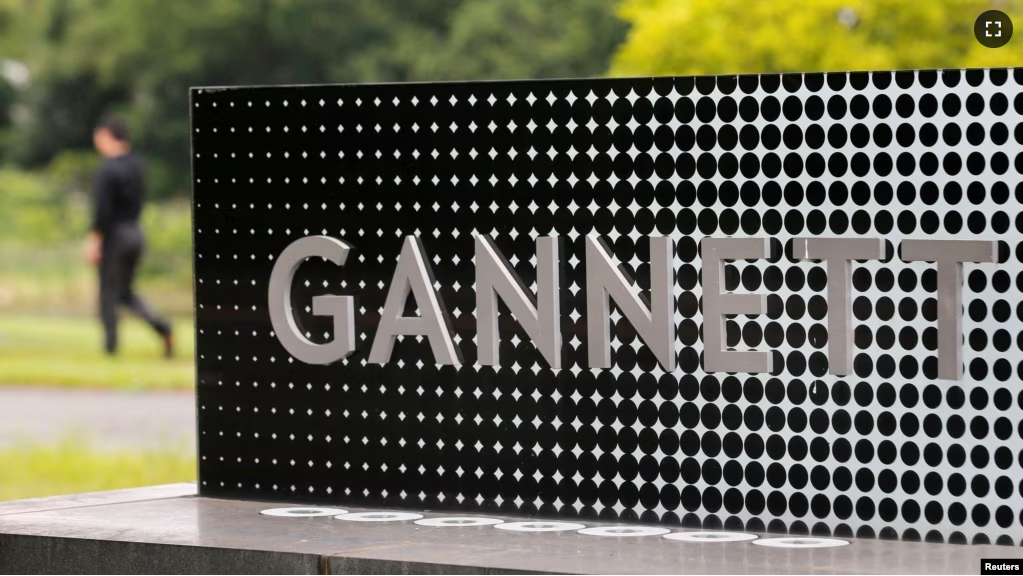 FILE - The logo of Gannett Co is seen outside their corporate headquarters in McLean, Virginia, July 23, 2013. ( REUTERS/Larry Downing//File Photo)