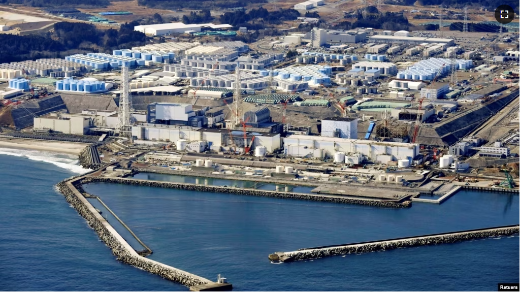 FILE - An aerial view shows the storage tanks for treated water at the tsunami-crippled Fukushima Daiichi nuclear power plant in Okuma town, Fukushima prefecture, Japan, on February 13, 2021. (Kyodo/via REUTERS)