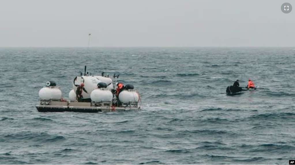 In this photo released by Action Aviation, the submersible Titan is prepared for a dive into a remote area of the Atlantic Ocean on an expedition to the Titanic on Sunday, June 18, 2023. (Action Aviation via AP)