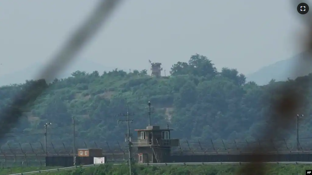 A North Korean military guard post, background, and a South Korean post, front, are seen in Paju South Korea, Thursday, July 20, 2023. (AP Photo/Ahn Young-joon)