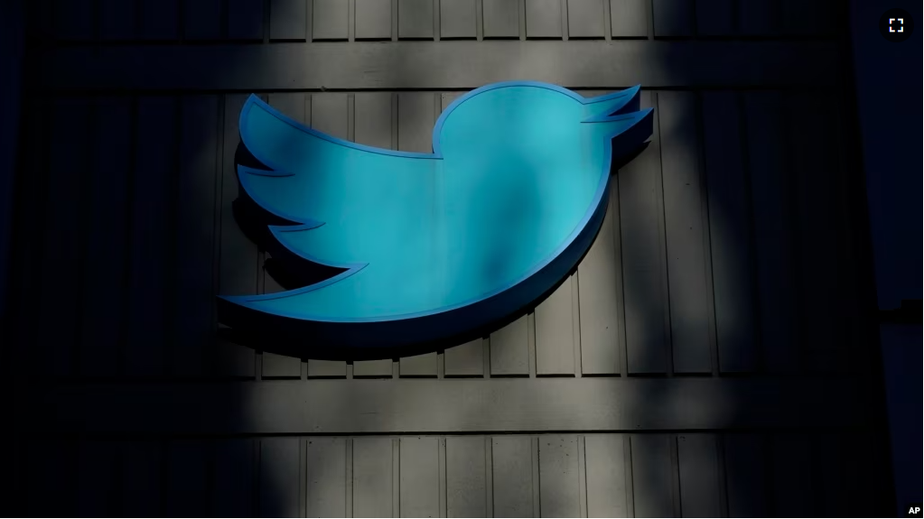 FILE - A sign at Twitter headquarters is shown in San Francisco, Friday, Nov. 18, 2022. (AP Photo/Jeff Chiu)