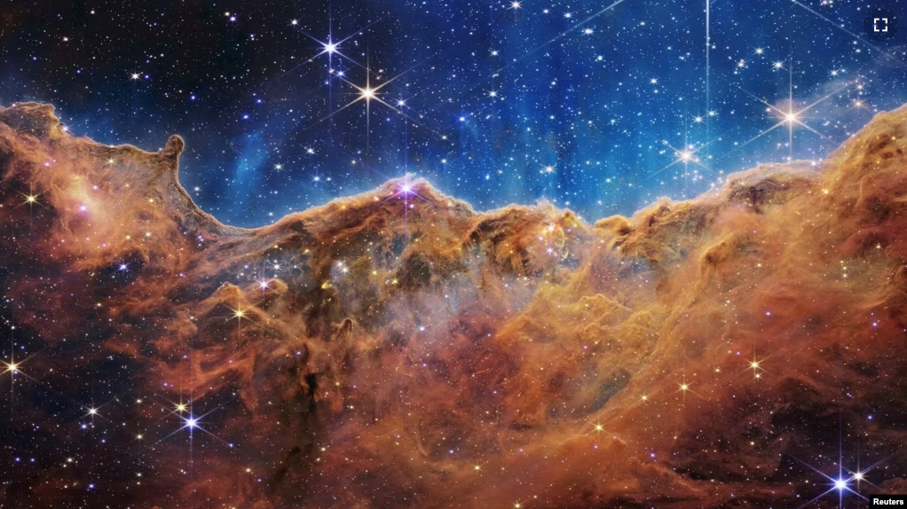 The "Cosmic Cliffs" of the Carina Nebula are seen in this image, captured by NASA's James Webb Space Telescope and released on July 12, 2022. (Image Credit: NASA, ESA, CSA, STScI, Webb ERO Production Team/Handout via REUTERS)