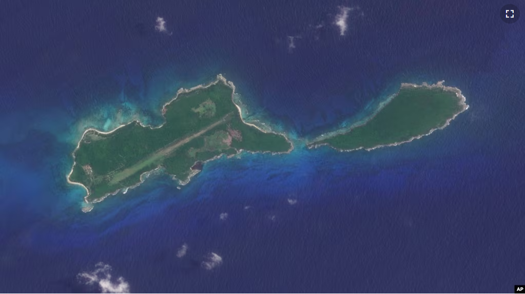 This image provided by Planet Labs PBC shows Islas del Cisne in Honduras, on July 13, 2023. Honduras says it will build a maximum security prison on this tiny island off its Caribbean coast to contain the country's most dangerous criminals.(Planet Labs PBC via AP)