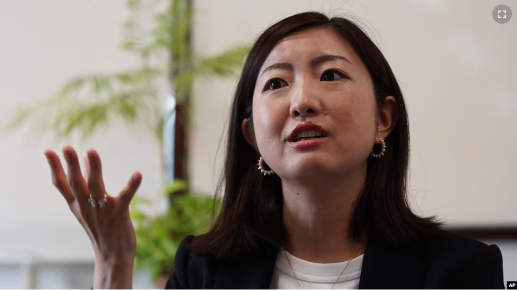 Lawyer Akiko Ozawa, whose law firm advises job-leavers although usually it represents companies, speaks during an interview with The Associated Press on June 22, 2023, in Tokyo. (AP Photo/Eugene Hoshiko)