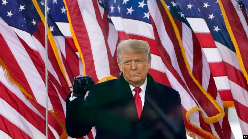 FILE - President Donald Trump gestures as he arrives to speak at a rally on Jan. 6, 2021, in Washington, DC. (AP Photo/Jacquelyn Martin, File)