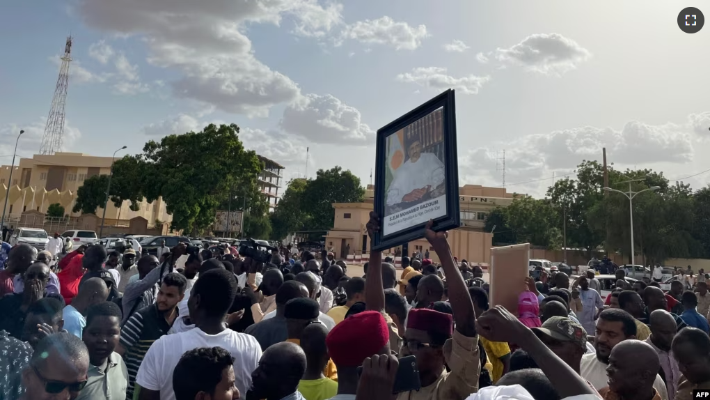 Supporters of Nigerien President Mohamed Bazoum gather to show their support for him in Niamey on July 26, 2023. (Photo by AFP)