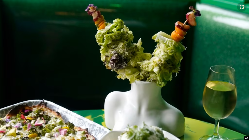 The Goddess dish, top, is shown at Shuggie's Trash Pie restaurant in San Francisco, Wednesday, June 14, 2023. (AP Photo/Jeff Chiu)