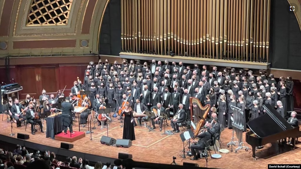 The National Arab Orchestra (NAO)performs onstage with supporting chorus. (Courtesy NAO/David Schall)