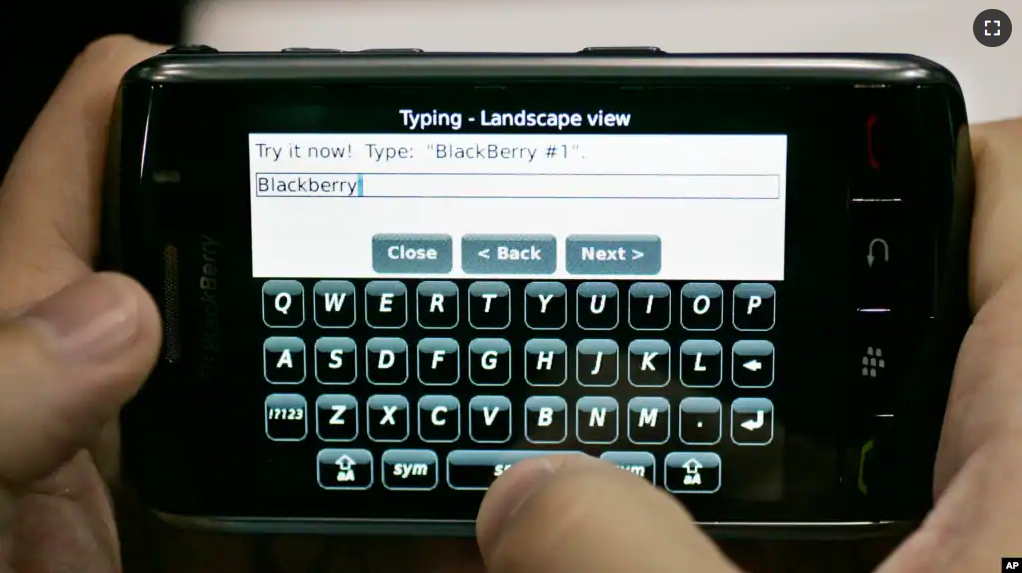 In this Nov. 21, 2008 file photo, a person types on a portable device using his thumbs in Mountain View, Calif., Friday, Nov. 21, 2008. (AP Photo/Paul Sakuma, file)